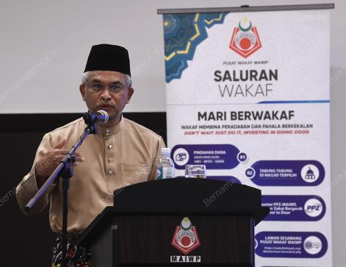 TAN SRI DR MOHD DAUD BAKAR