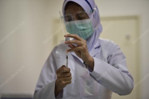 PROGRAM VAKSINASI COVID-19 PERINGKAT KEMENTERIAN PERTAHANAN