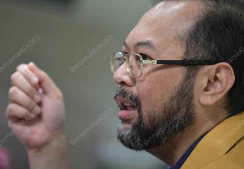 DATUK HASNUL FADHLY HASAN