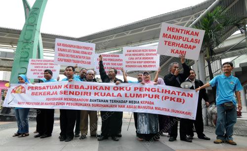 KL14_08115_BANTAHAN_OKU_08012015