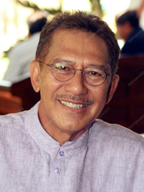 AZMI KHALID
