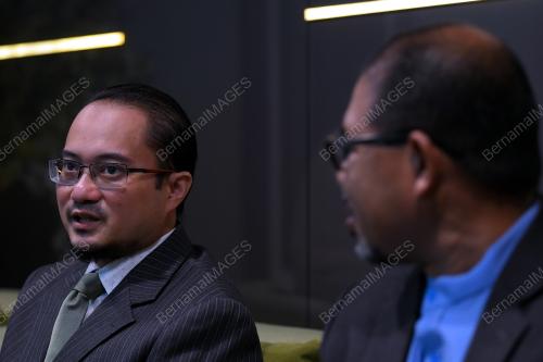 MUSTAKIM MOHAMAD