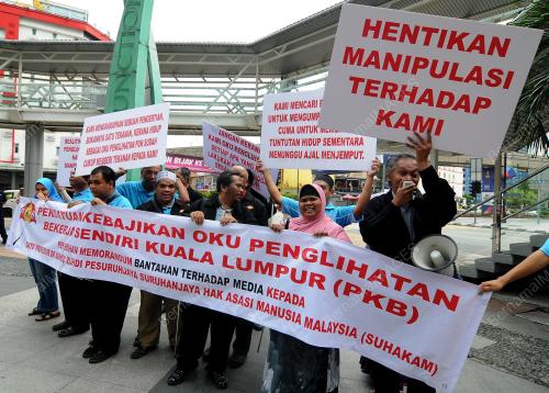 KL15_08115_BANTAHAN_OKU_08012015