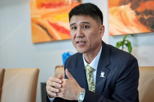 QINGGUO KANG