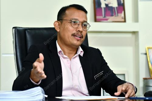 MOHD ZAHIR SHARI
