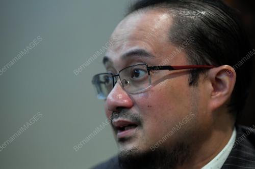 MUSTAKIM MOHAMAD