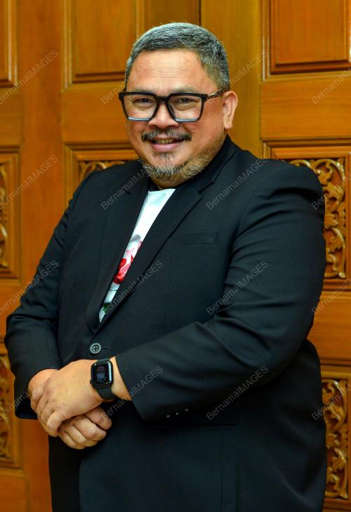 HAMZAH TAHIR
