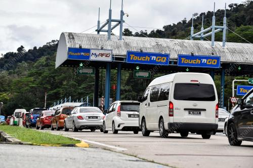 TINJAUAN ALIRAN TRAFIK TOL GOMBAK