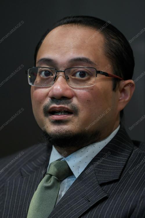 MUSTAKIM MOHAMAD