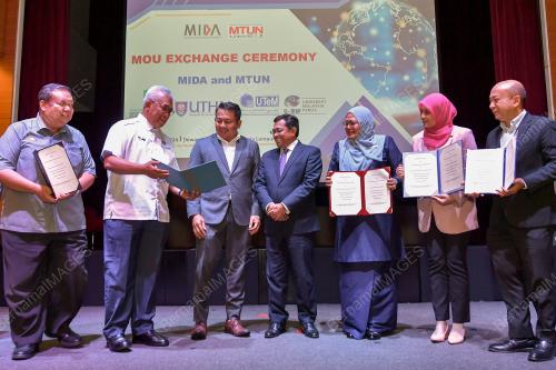 MOU BETWEEN MIDA AND MTUN