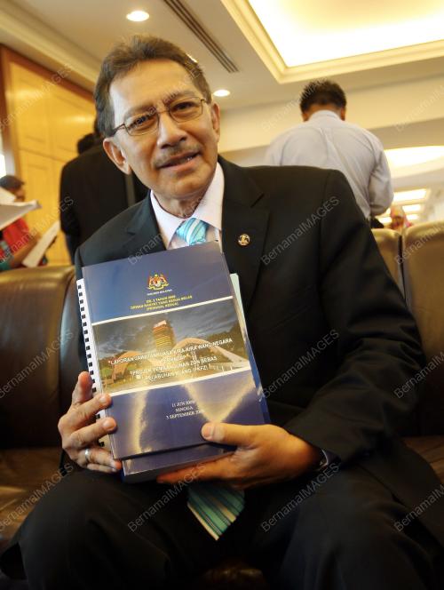 AZMI KHALID
