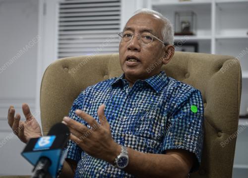 DATUK SERI MAHDZIR KHALID