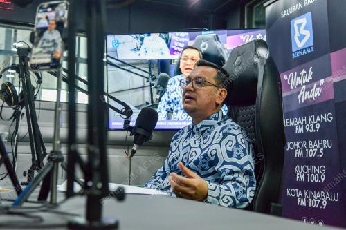 NIK KAMARUZAMAN NIK HUSIN