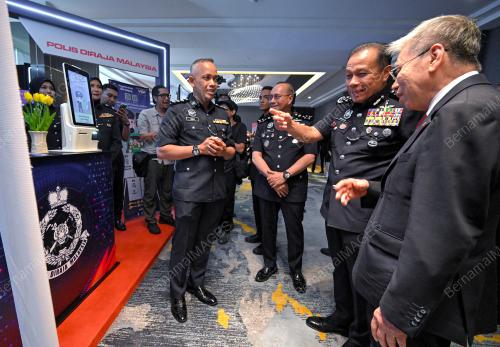 TAN SRI MOHD KHALID