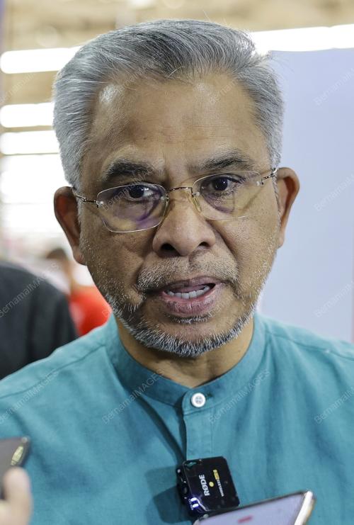 TAN SRI DR MOHD DAUD BAKAR