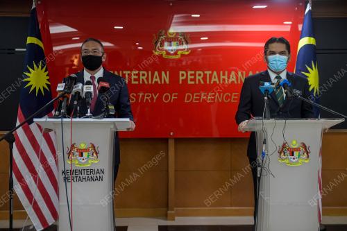 DATUK SERI HISHAMMUDDIN HUSSEIN DAN DATUK DR MOHD RADZI MD JIDIN