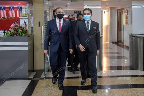 DATUK SERI HISHAMMUDDIN HUSSEIN DAN DATUK DR MOHD RADZI MD JIDIN