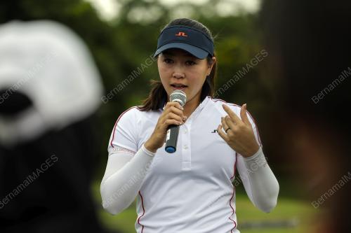 KELLY TAN
