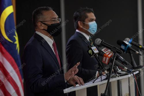 DATUK SERI HISHAMMUDDIN HUSSEIN DAN DATUK DR MOHD RADZI MD JIDIN