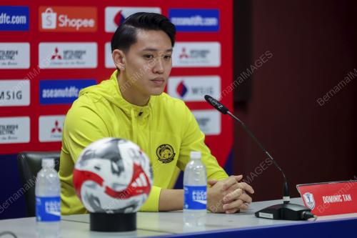 DOMINIC TAN