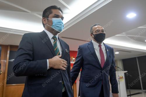 DATUK SERI HISHAMMUDDIN HUSSEIN DAN DATUK DR MOHD RADZI MD JIDIN