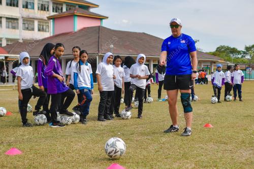 FORMER US WOMEN'S FOOTBALL PLAYER