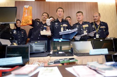 KL30_17042015_MACAU_SCAM