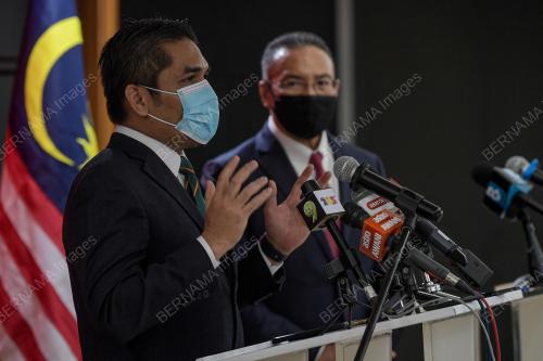 DATUK SERI HISHAMMUDDIN HUSSEIN DAN DATUK DR MOHD RADZI MD JIDIN