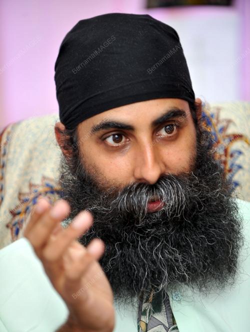 DR SARJIT SINGH