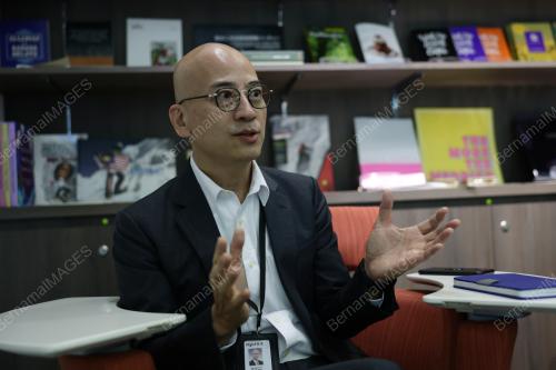MARK TAN