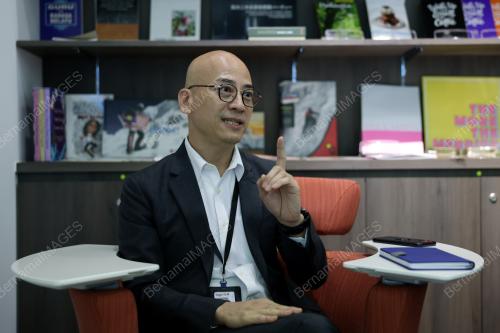 MARK TAN