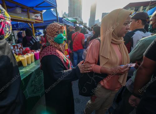 PENGEMIS WARGA ASING DI BAZAR RAMADHAN