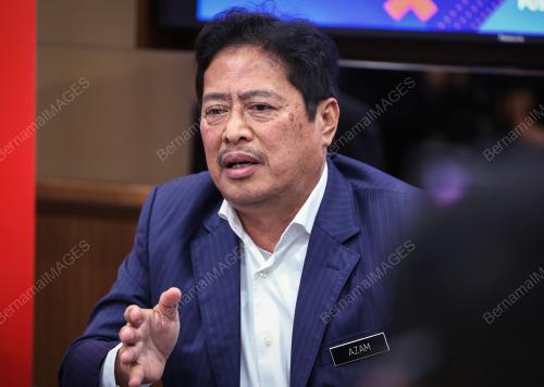 TAN SRI AZAM BAKI