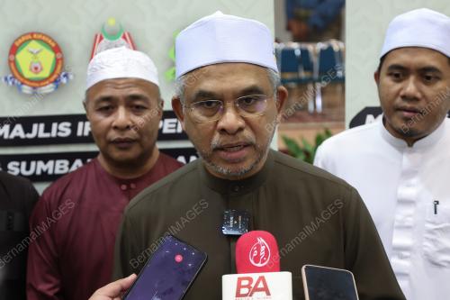 TAN SRI DR MOHD DAUD BAKAR