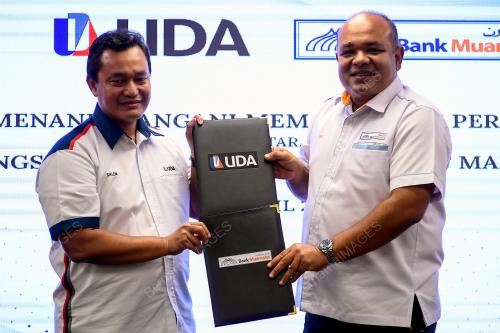 MAJLIS MENANDATANGANI MEMORANDUM PERSEFAHAMAN DI ANTARA UDA HOLDINGS BERHAD DENGAN BANK MUAMALAT MALAYSIA BERHAD