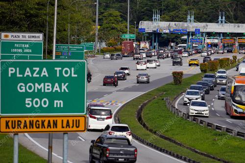 TINJAUAN ALIRAN TRAFIK TOL GOMBAK