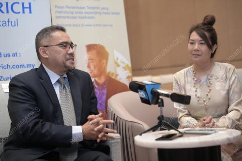 MOU ANTARA OKU SENTRAL DAN ZURICH TERAS LEGACY