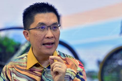 WONG KAH WOH