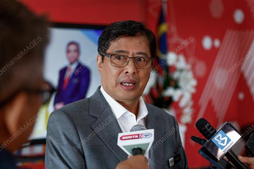 TAN SRI AZAM BAKI