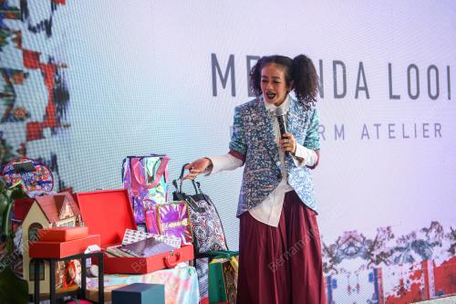 MELINDA LOOI