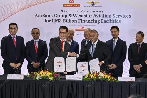 SIGNING CEREMONY BETWEEN AMBANK AND WESTSTAR