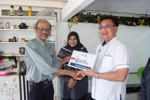 NIK KAMARUZAMAN NIK HUSIN