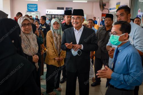 TUN MOHD ALI RUSTAM