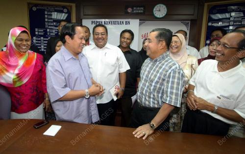 AHMAD MASLAN