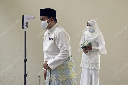 AKAD NIKAH SEMASA SEKATAN PERGERAKAN PENUH DI NEGERI SEMBILAN