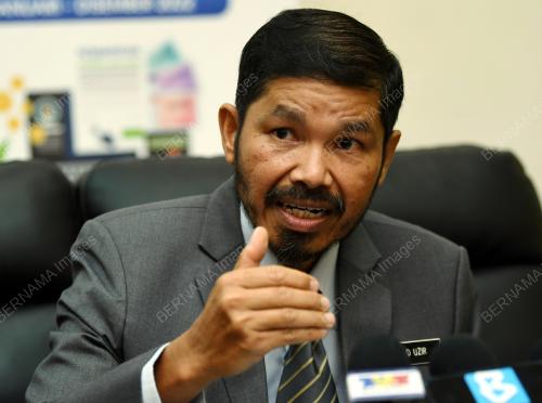 DATUK SERI DR MOHD UZIR MAHIDIN