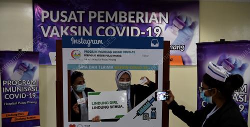 SUNTIKAN VAKSIN COVID