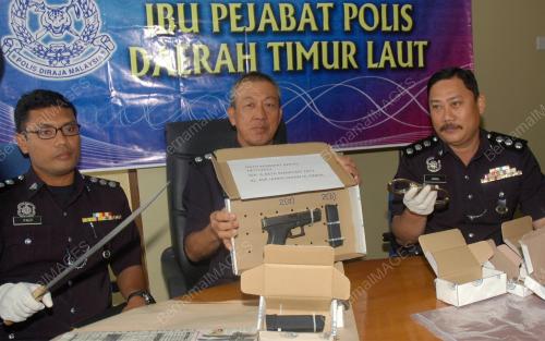 PG01_03042012_POLIS_PISTOL