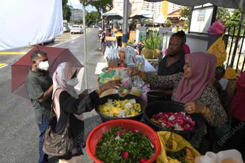 PENJUAL BUNYA DI TANAH PERKUBURAN