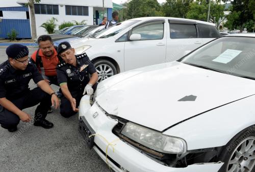 PG01_25112014_KERETA_CURI